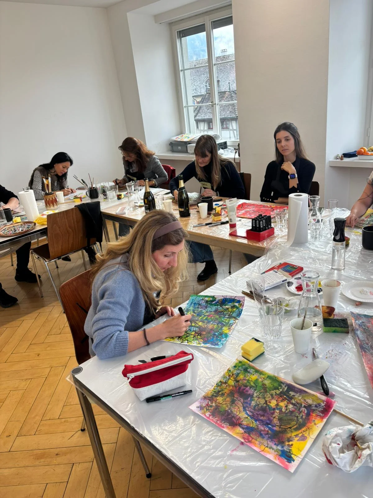 Art studio workshop with colorful paintings