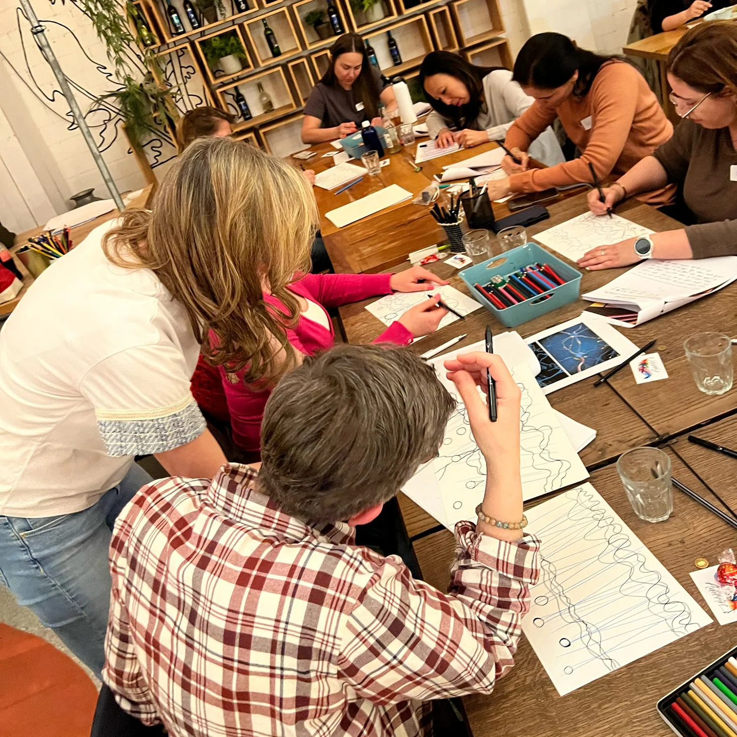 Workshop participants focused on their neurographica drawings